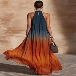Detail view of a stunning halter gradient long dress, perfect for beach summer vacation.