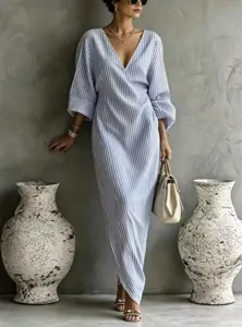 Detail view of the blue and white striped long sleeve V-neck vacation dress fabric and style.