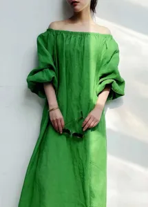 Green off-the-shoulder casual long dress detail view, loose fit elegant daily apparel.