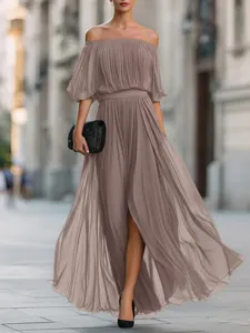 Off-shoulder pleated chiffon maxi dress detail, elegant street style summer fashion look.