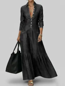 Details of the vintage style denim maxi dress featuring button front and side pockets.