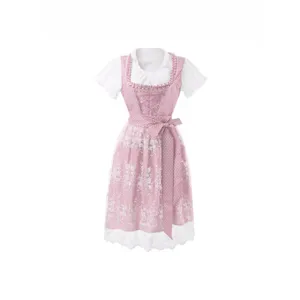 Traditional pink Oktoberfest Dirndl dress with white blouse and lace apron for women.