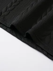Detail van de zwarte heren t-shirt stof met unieke wafeltextuur en gebreide streep.
