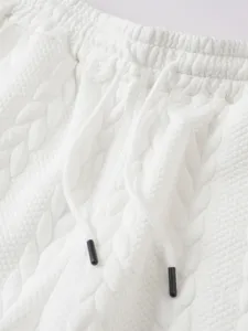 Men casual sports shorts close up detail white jacquard fabric drawstring style