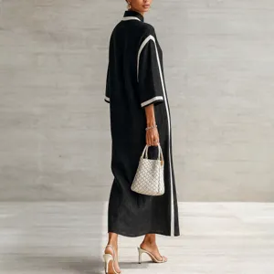 Black maxi dress with white trim, stand collar, elegant long sleeve casual wear main view