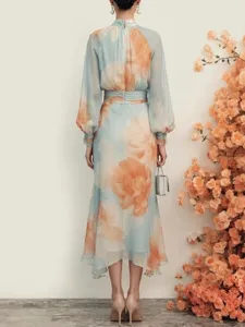 Stunning back view of a blue and orange floral chiffon dress, elegant detail and slim fit.