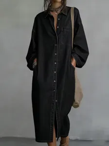 Details of the black denim long sleeve shirt dress with lapel and single-breasted design.