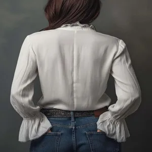 Detailed view of the casual solid color long sleeve ruffle collar women blouse shirt in white.