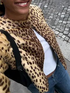 Leopard print cropped jacket detail shot showcasing the soft texture and stylish design.