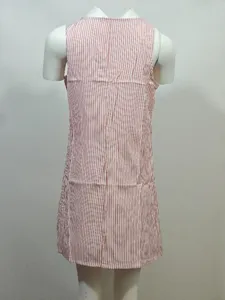 Detail view of a casual pink and white striped sleeveless dress, showing back fabric and cut.