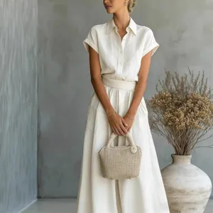 Elegant solid color short-sleeve shirt and wide-leg pants two-piece set for women.