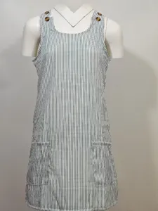 Casual striped sleeveless mini dress with scoop neck, front pockets and tortoiseshell buttons.
