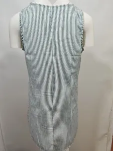 Back view detail of casual green and white striped dress showing fabric and sleeveless cut.