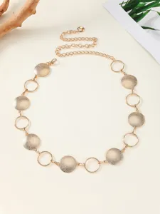 Gold metal waist chain featuring geometric round disc links and adjustable clasp for women dress.