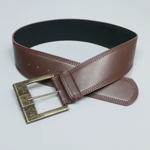 Retro wide brown leather belt for women, stylish vintage waist cincher with antique buckle.