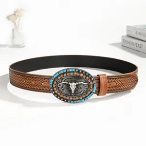 Ceinture en cuir western vintage avec boucle de crâne de taureau et détails turquoise.