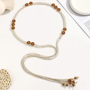 Boho braided waist belt for women, chic woven rope dress belt with wooden beads & floral accents.
