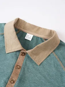 Close-up detail view of the contrast color lapel polo shirt collar and button placket.