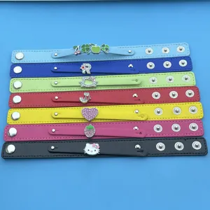Colorful faux leather double-layer snap wristbands set with cute charms for DIY fashion.