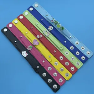 Faux leather slap bracelets with metal snaps and cute charms, colorful fashion DIY wristbands.