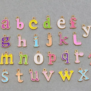 Detailed shot of colorful enamel lowercase letter charms, perfect for DIY jewelry making.