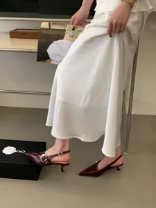 Elegant pointed toe slingback kitten heels with chic buckle detail for women sophisticated wear.