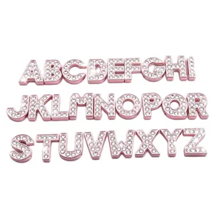 Pink rhinestone alphabet letter charms for DIY jewelry making bracelets and pet collars.