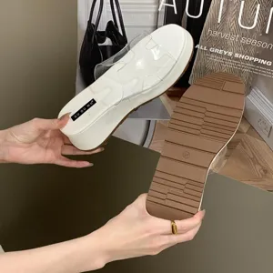 Detail view of women platform wedge sandal transparent strap and brown anti slip sole 36