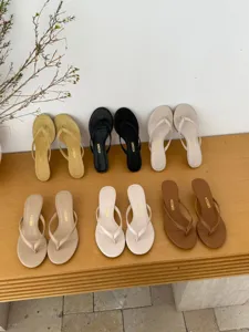 Detail view of summer women's minimalist heeled thong sandals, stylish and versatile footwear.