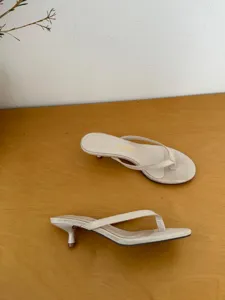 Minimalist beige thong kitten heel sandals for women summer stylish casual footwear.