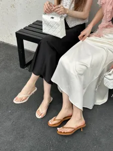 Minimalist thong high heel sandals for women, stylish summer outdoor slide shoes with slim heels.