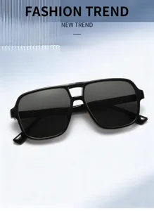 Detail shot of retro square double bridge aviator sunglasses with dark lenses for outdoor use.