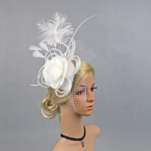 Elegant white fascinator with flower and feathers, perfect for weddings, parties, and events.