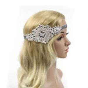 Vintage 1920s crystal rhinestone flapper headband bridal party hair accessory detail.