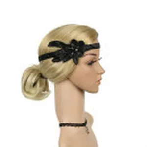 1920s vintage black feathered beaded flapper headband and choker set for party dress up.