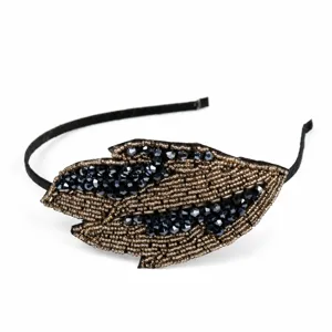 Detailed view of the 1920s vintage beaded leaf headband with sparkling crystals for elegant events.