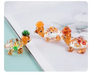 Close up macro detail of cute mini glass turtle figurine desktop ornament decoration
