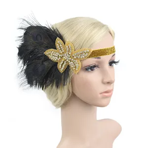 Vintage 1920s Gatsby feather rhinestone headband details, elegant luxury gold hair accessory.