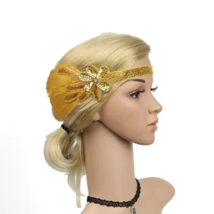 Vintage 1920s gold sequin feather headband flapper headpiece for party costume accessory.