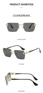 Detail view of rimless sunglasses with gold metal frame and black temples, chic style.