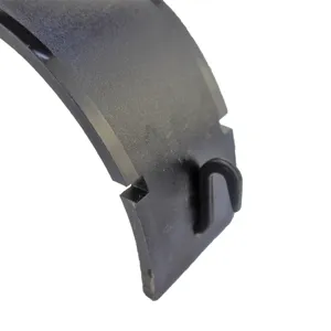 Detail shot of black plastic jewelry display stand component with curved hook part.