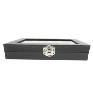 Detailed view of the black jewelry display box with clear glass lid and secure metal lock.