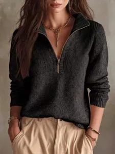 Detail view of women half-zip ribbed knit sweater, long sleeve slim fit pullover for autumn.