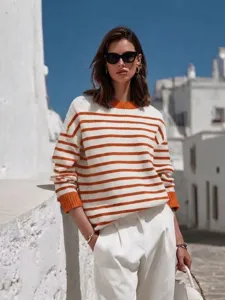 Casual striped knit sweater featuring contrast cuffs and relaxed fit for daily wear.