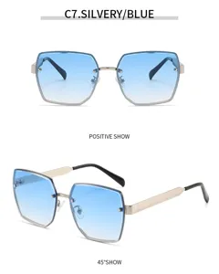 Grandes lunettes de soleil sans monture degradees bleu pour femmes, style vintage.