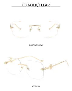 Lunettes de soleil carreas sans monture elegantes avec monture doree et branches serpent.