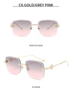 Lunettes de soleil carrées sans monture dégradées, branches serpent et détails dorés chics.