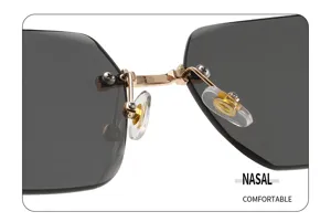Men's rimless polygon sunglasses detail shot, metal bridge with comfortable clear nose pads.