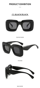 Vista detallada de gafas de sol cuadradas chunky, estilo urbano Y2K negro de moda.