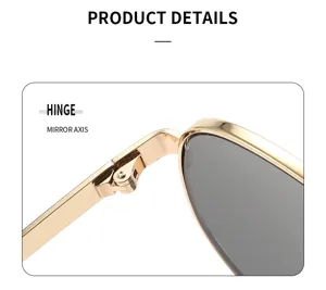Nahaufnahme der luxuriösen goldenen Sonnenbrille Scharnier und Spiegelachse Struktur.